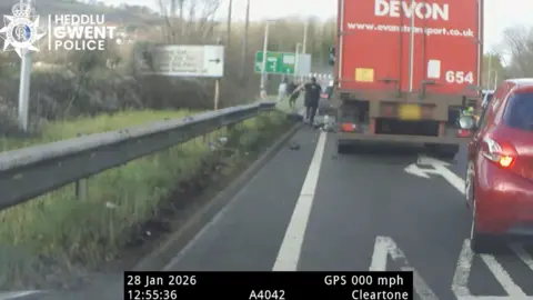 Men running from police after crashing car in to lorry 