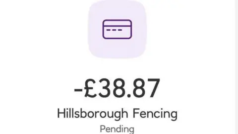 Lucy Ashton/BBC Screen shot of a payment on a mobile phone. It says -£38.87 Hillsborough Fencing Pending