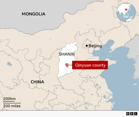 Map showing the location of Qinyuan County in Shanxi province, northern China. The county is highlighted in red within Shanxi, with Beijing marked to the northeast and Mongolia labelled to the north. An inset globe indicates the region’s position in East Asia.