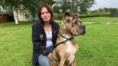 BBC woman and large dog