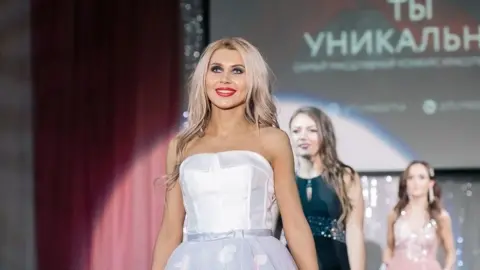 Yana Terekhova Oskana Zotova taking part in the beauty pageant