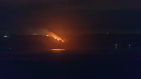 Richard Lord Sark west coast fire viewed from Guernsey