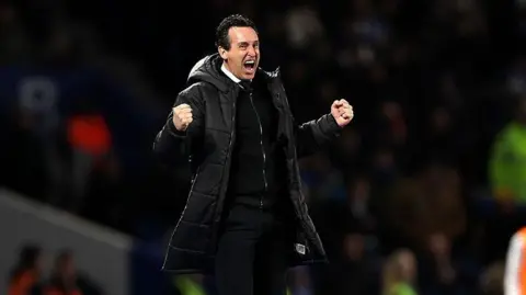 Unai Emery celebrates Aston Villa's win at Brighton