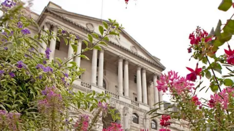 Newscast Bank of England with flowers in front of it