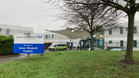 BBC File image showing the exterior of Queen Elizabeth Hospital, which is part of the Trust involved.