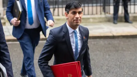 PA Media Chancellor Rishi Sunak in Downing Street