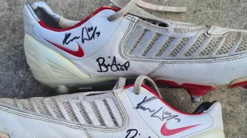 John Ryan A pair of signed football boots