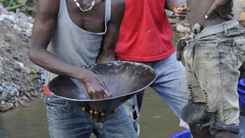 Getty Images Illicit goldmine in Liberia