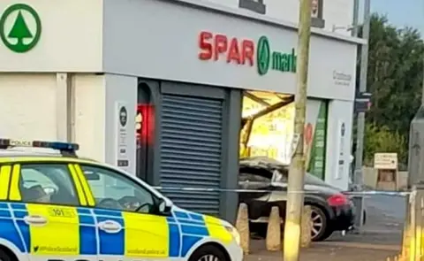 Iain McCulloch Car crashed into Spar shop in Crosshouse