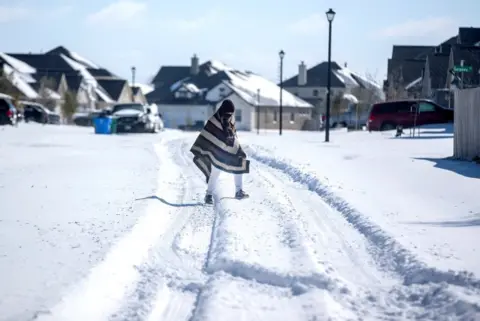 Reuters Neighbourhoods like this one in Pflugerville faced many hours without electricity