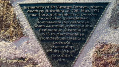 A memorial plaque was erected at the top of the riverbank beside the footbridge to mark the 30th anniversary of Dr Duncan's death.