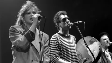  Brian Rasic/Getty Images The Pogues - Kirsty Mccall And Shane Macgowan - 1980S, The Pogues - Kirsty Mccall And Shane Macgowan - 1980s