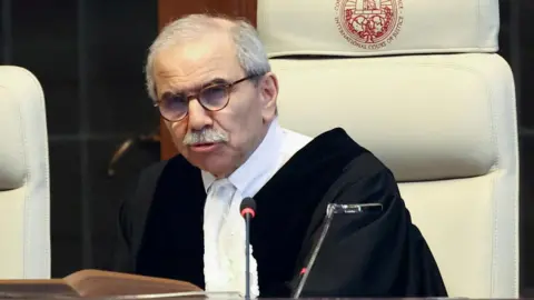 Reuters President of the International Court of Justice (ICJ) Nawaf Salam attends hearing in The Hague, Netherlands (May 16, 2024) 