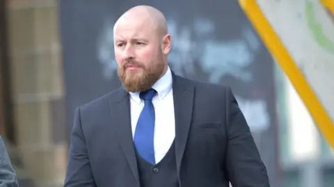 Craig Glen leaving Glasgow Sheriff Court.