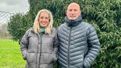 Gavin and Louise A pair of people smiling at camera