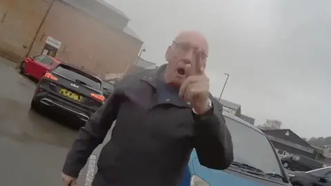 CPS Angry man pointing finger and woman