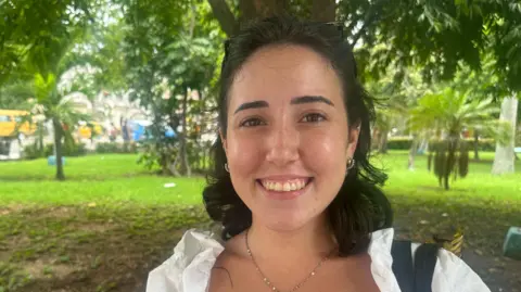 Architecture student Sabrina smiles at the camera