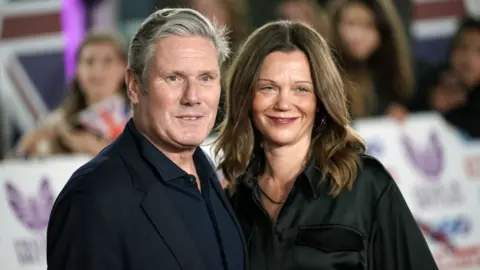 PA Media Sir Keir and Victoria Starmer