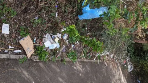 Eric Torrington Litter near a supermarket in Gloucester