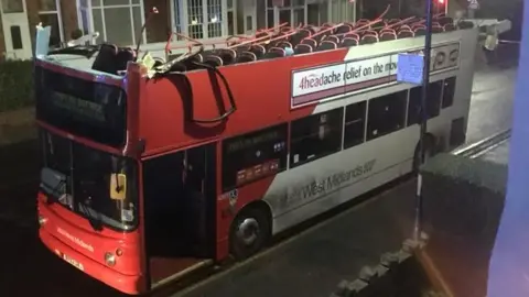 Amy Tunney The bus missing its roof