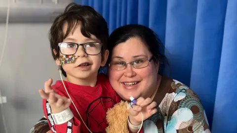 National Institute for Health and Care Research Leo and his mum, Corey, in hospital together