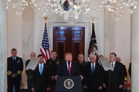 Getty Images Trump surrounded by generals