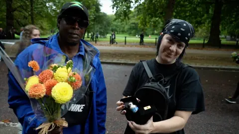 Mourners gather at Buckingham Palace