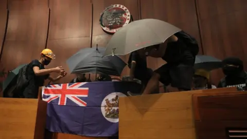 AFP Protesters in the Legislative council chamber