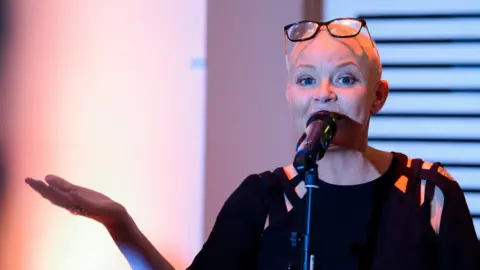 Joe Maher/Getty Images Gail Porter speaking from behind a microphone