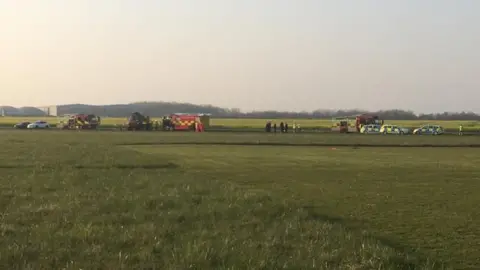 Guy Campbell/BBC Emergency services vehicles at Beccles Airfield