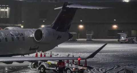 Getty Images Plane on tarmac in snow