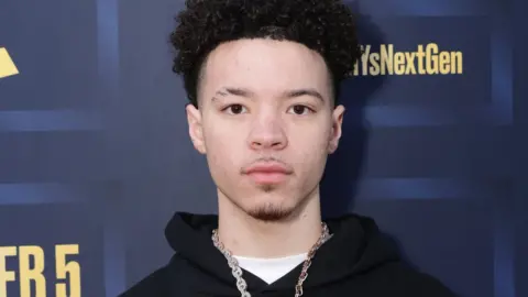 Getty Images Lil Mosey arrives to the 65th GRAMMY Awards - #GRAMMYsNextGen 2nd Annual Party at the GRAMMY House on February 03, 2023 in Los Angeles, California.