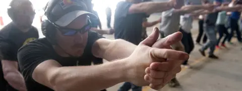 JASON CONNOLLY People in gun training