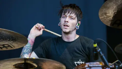 Getty Images Daniel Williams playing the drums in 2012