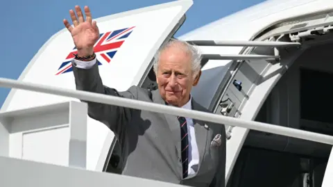 Reuters King Charles III waves as he boards his plane at Joint Base Andrews in Maryland.