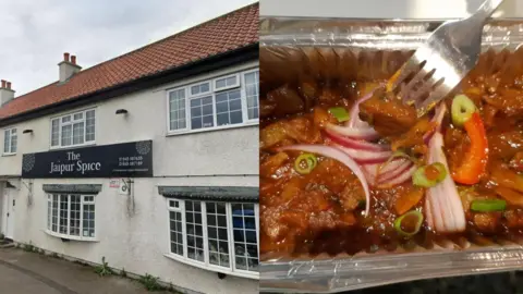 The front elevation of Jaipur Spice painted white with a black sign next to a photograph of a foil takeaway dish containg curry