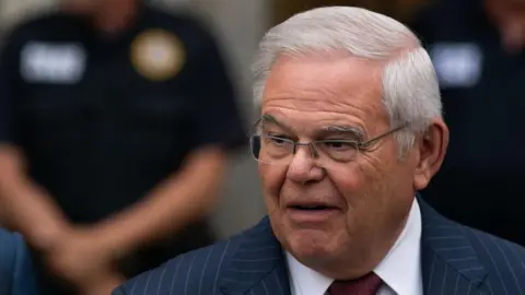 Bob Menendez speaks to the media as he exits Manhattan federal court on July 16 in New York City