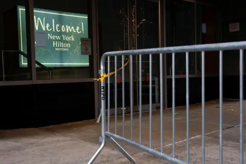 Reuters Police barrier outside the Hilton Hotel in New York City