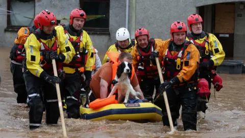 Reuters/Russell Cheyne Flood rescue in Brechin