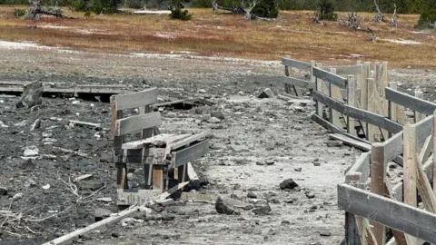 National Parks Service A bench is covered in debris from a hydrothermal explosion at Yellowstone National Park