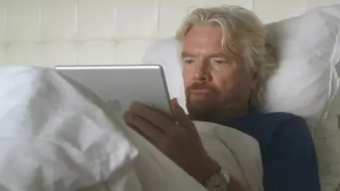 Virgin.com Richard Branson in bed