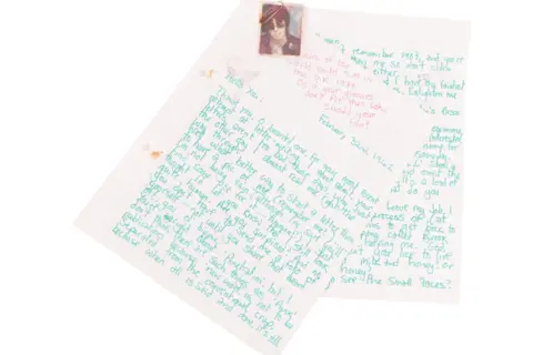 PA Media Two pages of a letter written in green ink