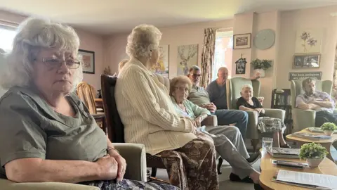 BBC Residents sitting in the Ivy House retirement home