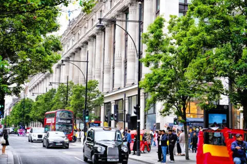 Getty Images Taxis and buses on Oxford Street
