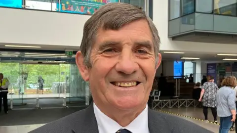 Philip Wilkinson looks into the camera after winning the 2024 Wiltshire PCC election