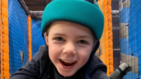 Family photo Isaac Tilley in soft play centre