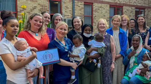 Surrey and Sussex Healthcare NHS Trust Surrey and Sussex Healthcare NHS Trust’s Health Inclusion Midwifery Service team