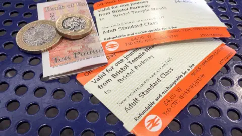 PA Rail ticket and cash
