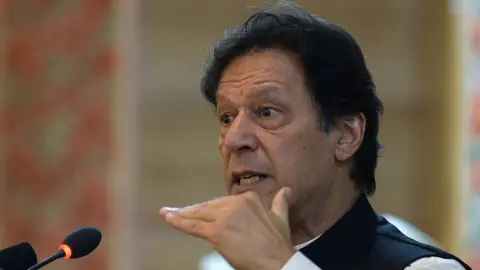 AFP Imran Khan is pictured in close-up mid-speech