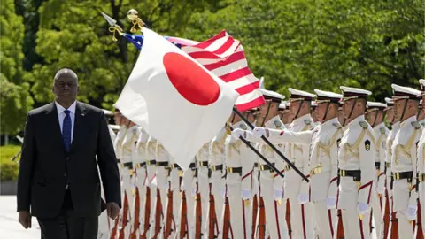 Getty Images The American military presence in Japan is accepted by many as inevitable